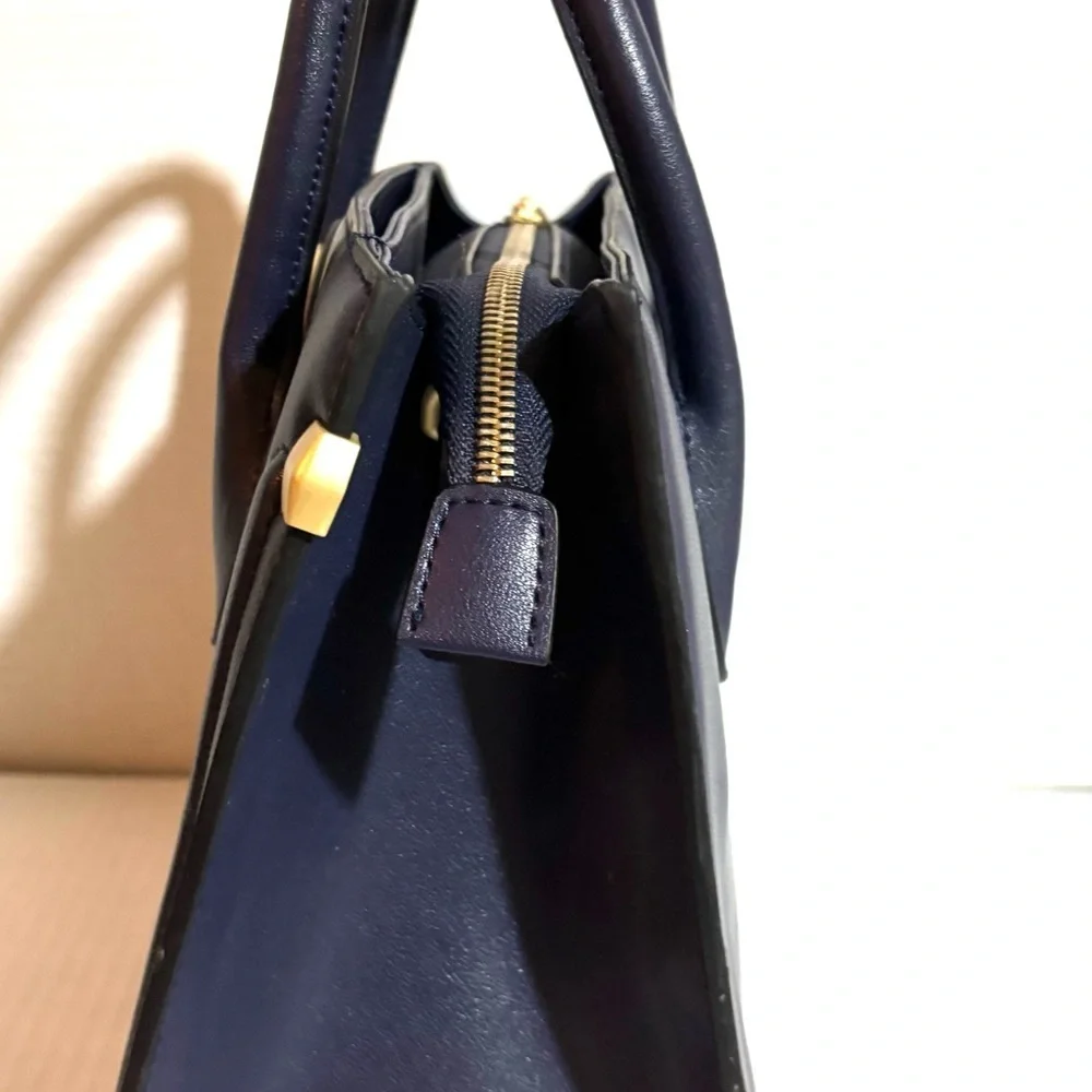 Celine Dion Elegant Navy blue satchel leather Handbag with Gold Accents